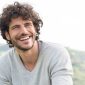 Young man smiling outdoors
